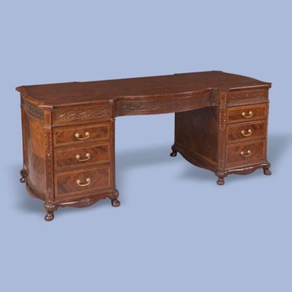 A Mahogany Serpentine Fronted Desk
